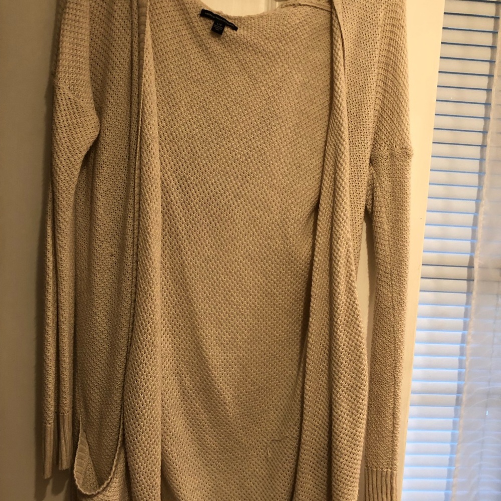 Cream colored American Eagle cardigan with hood and pockets